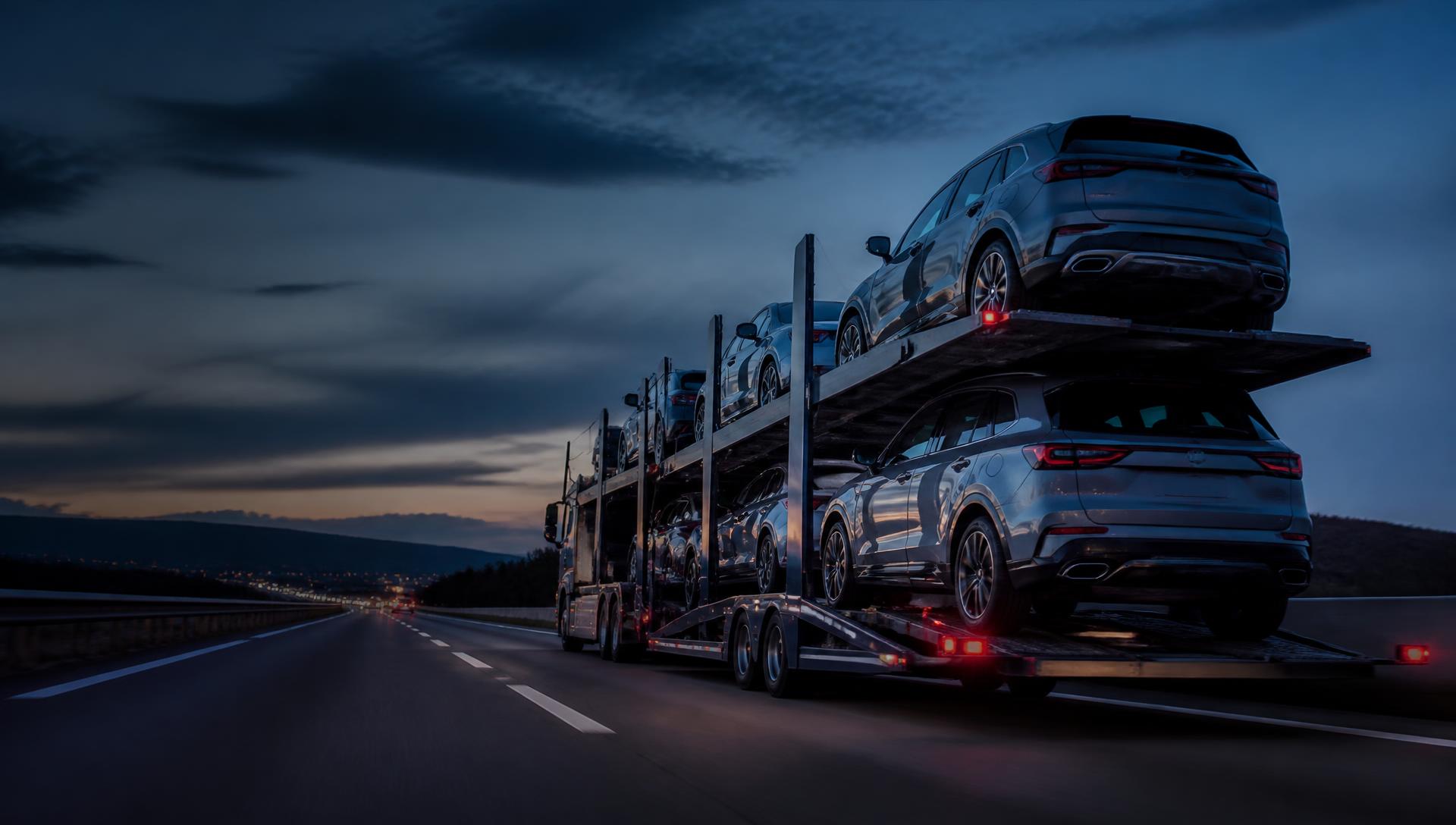 Car transporter carrying vehicles across the UK